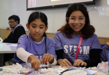 two girls doing stem activities