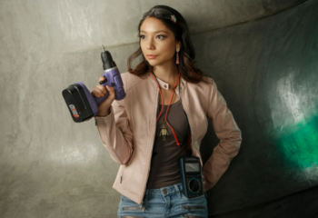 a woman with a power tool