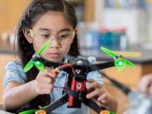 Girl playing with drone