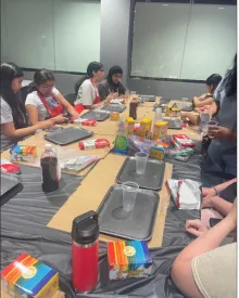 Group of girls building volcano models