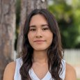 Gabriela R - Teenage girl with brown hair wearing white shirt